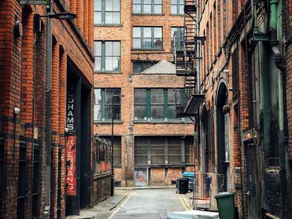 photo of street surrounded by buildings